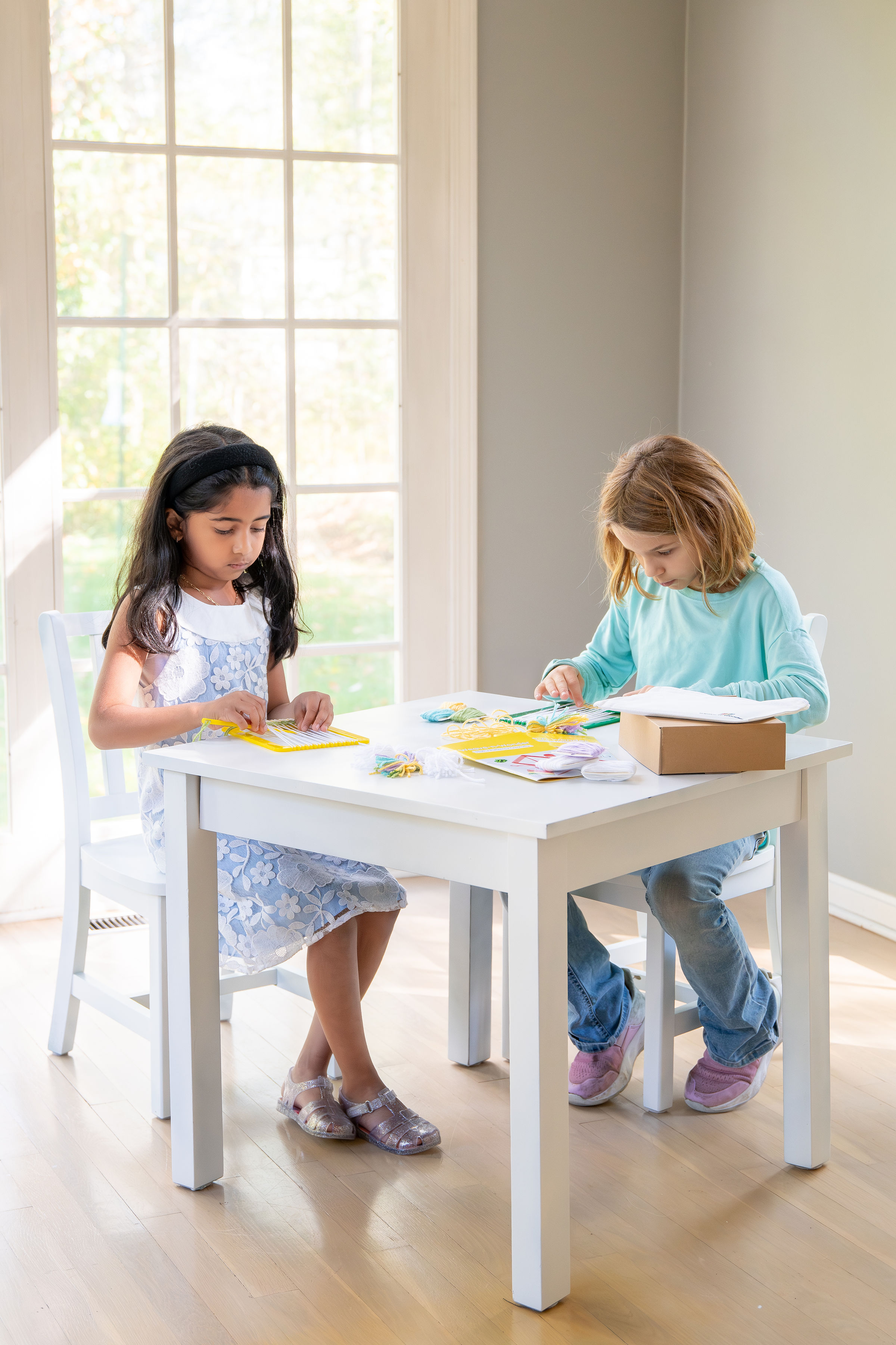 Child enjoying weaving activity